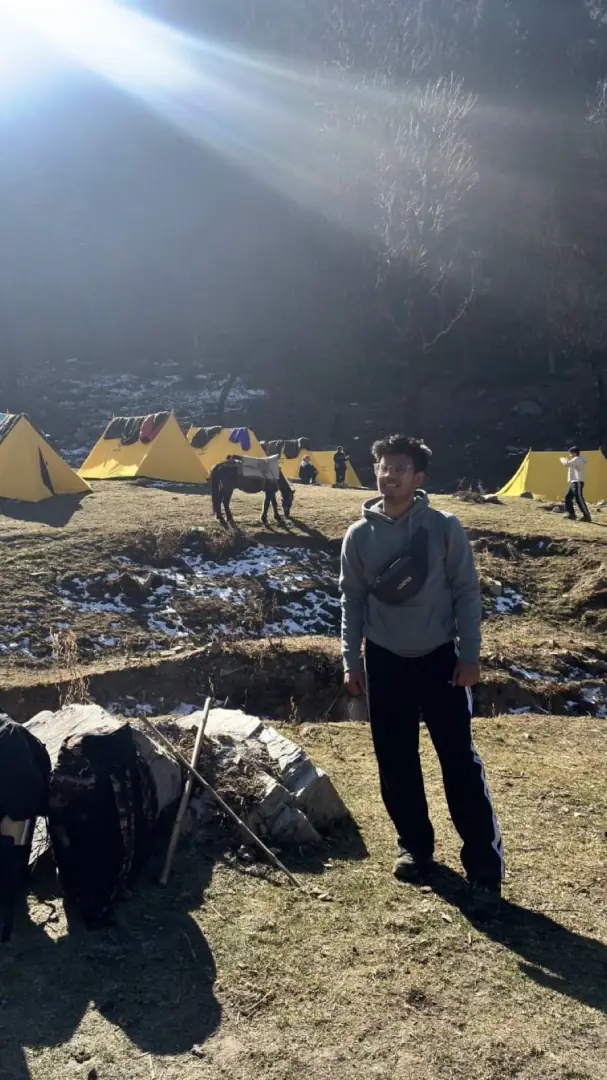 Gui camp with the tents and a mule