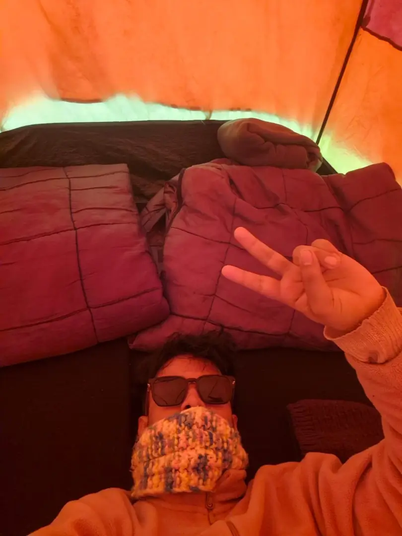 Inside the tent in the sleeping bag