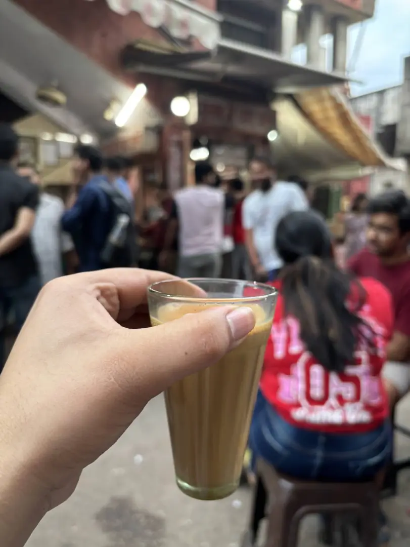 Chai in hand, walking